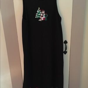 Black jumper with Christmas motifs embroidered around the bottom and back.